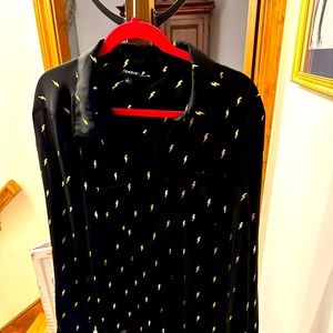 black long sleeve blouse with lighting bolts pattern.